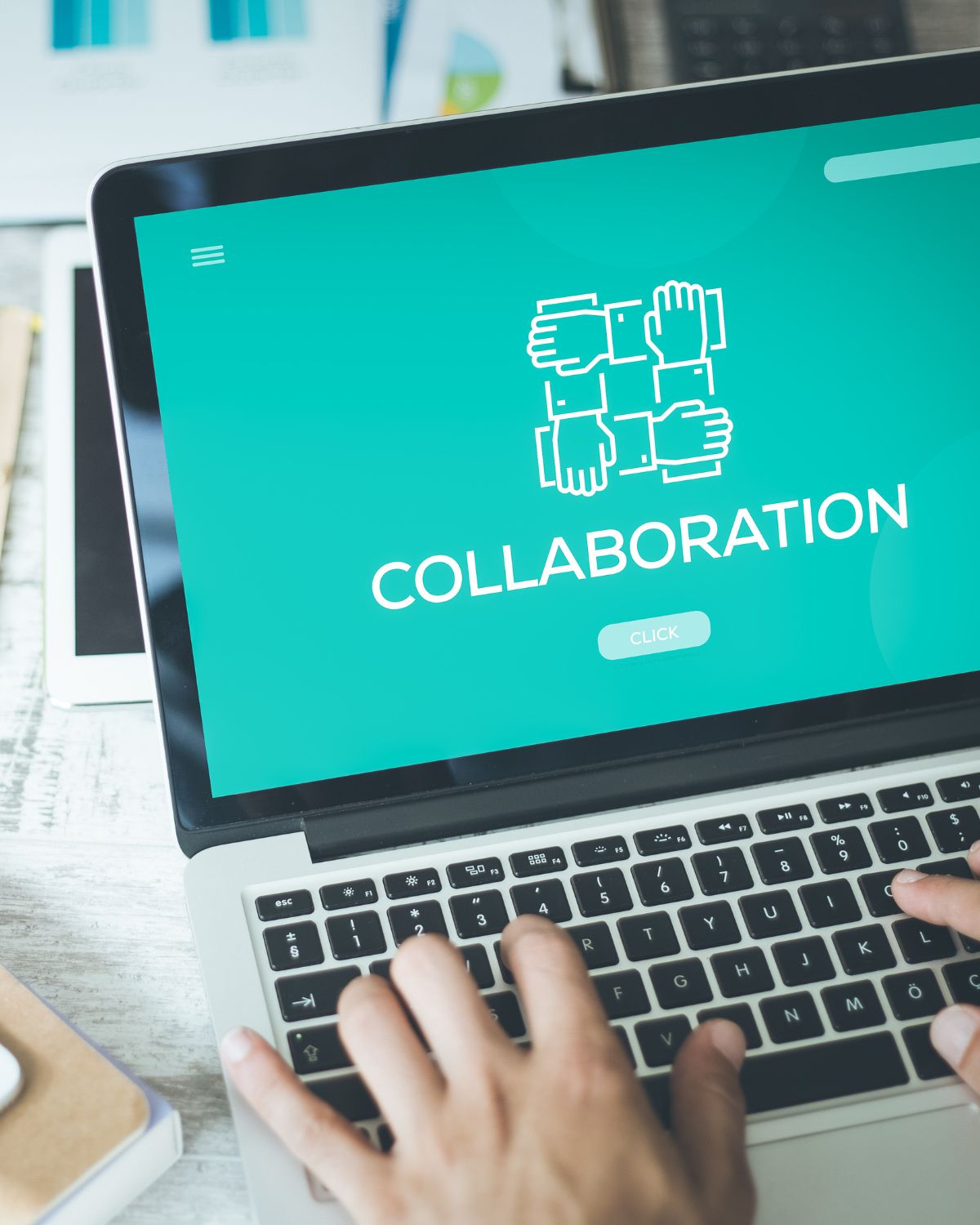 Close up image of a computer with the word collaboration on it.